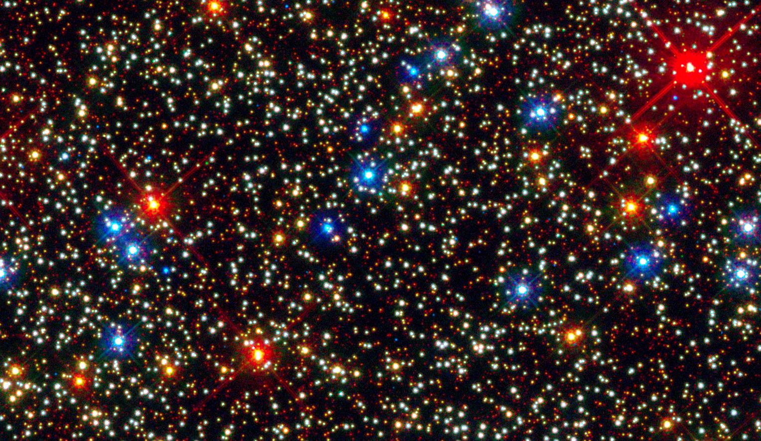 Крохотные звёзды (выделены голубым) того же типа, что и в шаровом скоплении Омега Центавра, доминируют в ранних эллиптических галактиках, и никто не знает, почему. (Иллюстрация NASA / ESA / Anderson / van der Marel.)