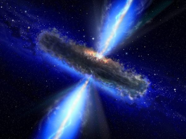 Блазары, сильнейшие источники электромагнитной активности в ядрах некоторых галактик, связываются именно со сверхмассивными ЧД. (Фото ESA / NASA / AVO Project / Paolo Padovani.) 